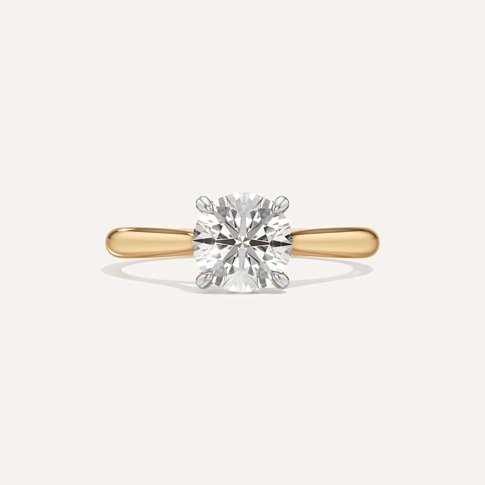 Held Round Solitaire Diamond